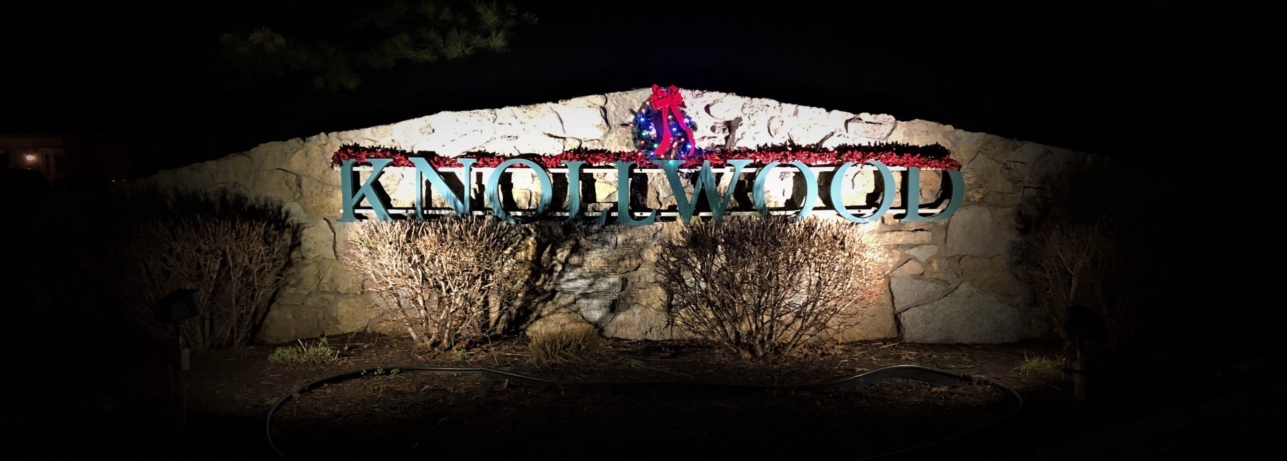 A sign that says " nollwog ".