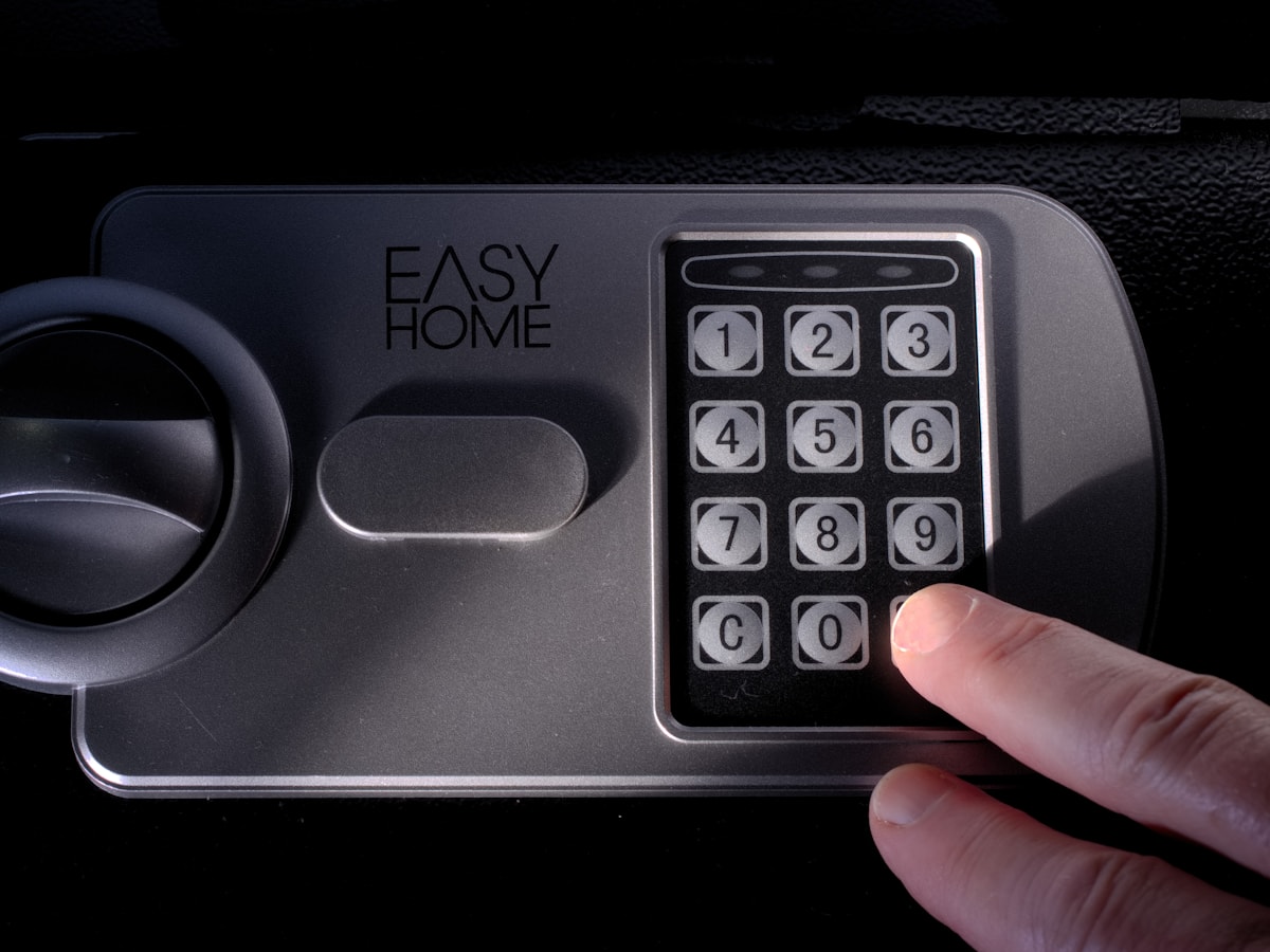 Wall-mounted alarm control panel with keypad after a monitored home security install